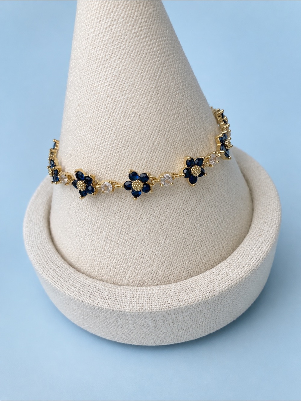 Gold Floral Bracelet with Navy Blue Stones